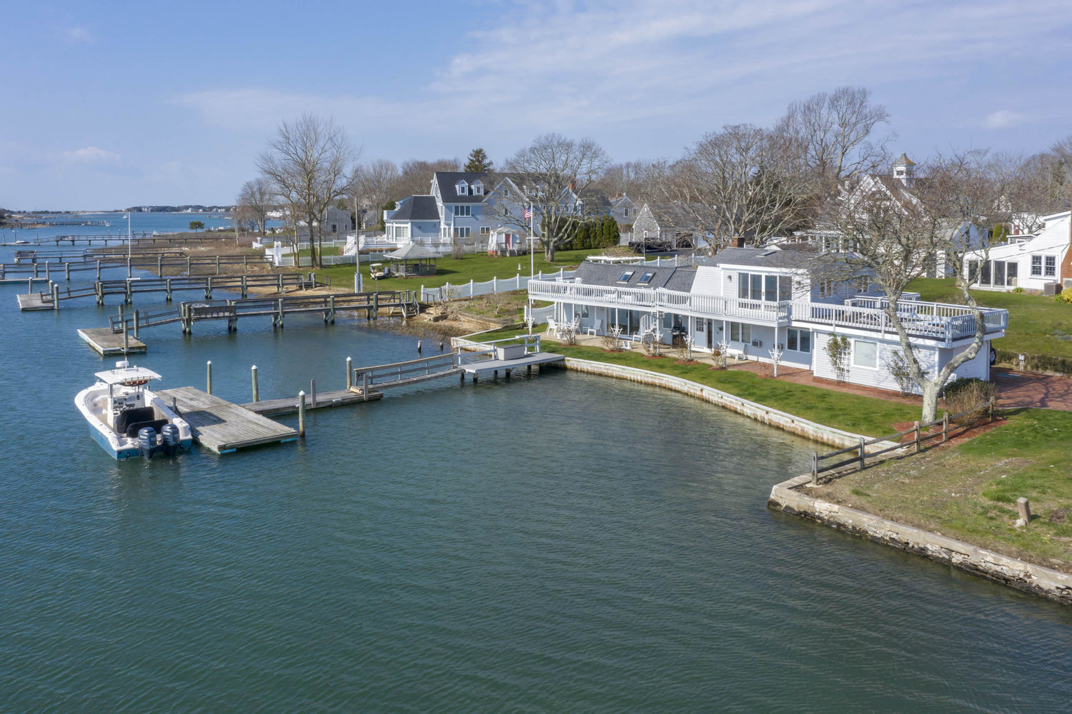 Photograph of homes on the water with docks in South Yarmouth
